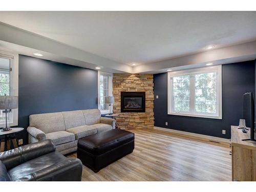 29 Lakeside Greens Close, Chestermere, AB - Indoor Photo Showing Living Room With Fireplace