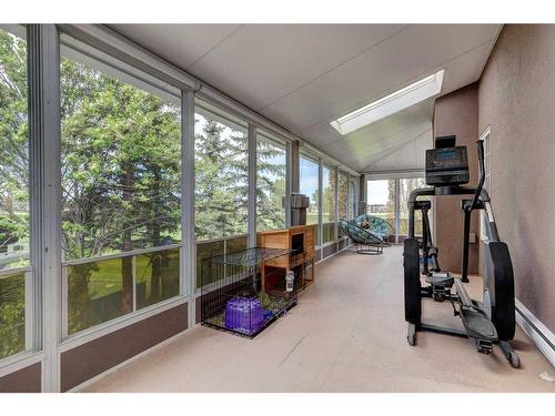 29 Lakeside Greens Close, Chestermere, AB - Indoor Photo Showing Gym Room