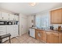 1316 38 Street Se, Calgary, AB  - Indoor Photo Showing Kitchen With Double Sink 