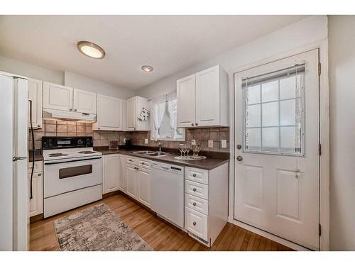 2301 14 Street Sw, Calgary, AB - Indoor Photo Showing Kitchen With Double Sink
