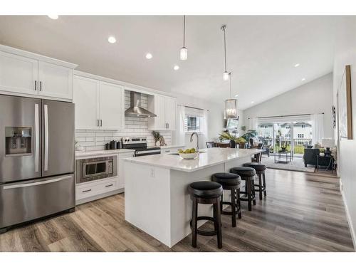 78 Bayview Circle Sw, Airdrie, AB - Indoor Photo Showing Kitchen With Upgraded Kitchen