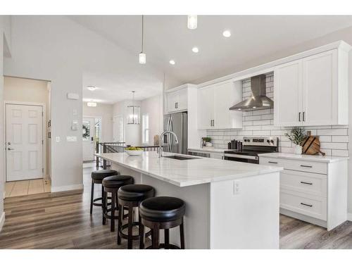 78 Bayview Circle Sw, Airdrie, AB - Indoor Photo Showing Kitchen With Upgraded Kitchen