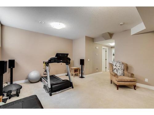 309 Ranch Close, Strathmore, AB - Indoor Photo Showing Gym Room
