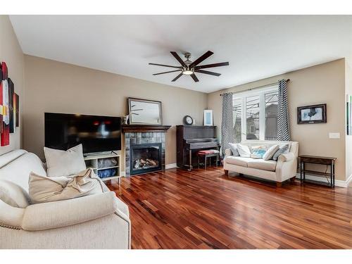 309 Ranch Close, Strathmore, AB - Indoor Photo Showing Living Room With Fireplace