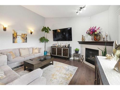 516 Rocky Vista Gardens Nw, Calgary, AB - Indoor Photo Showing Living Room With Fireplace