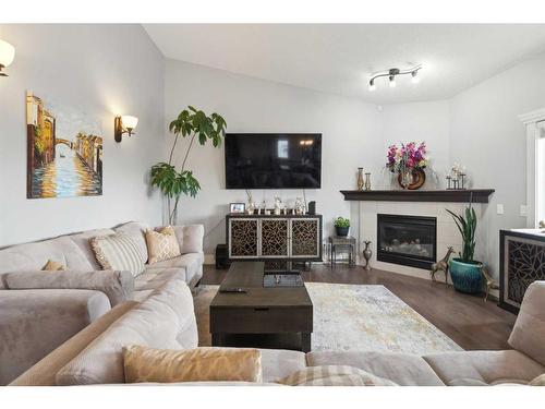 516 Rocky Vista Gardens Nw, Calgary, AB - Indoor Photo Showing Living Room With Fireplace