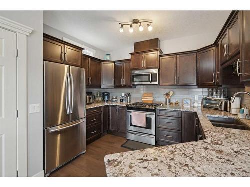 516 Rocky Vista Gardens Nw, Calgary, AB - Indoor Photo Showing Kitchen With Double Sink