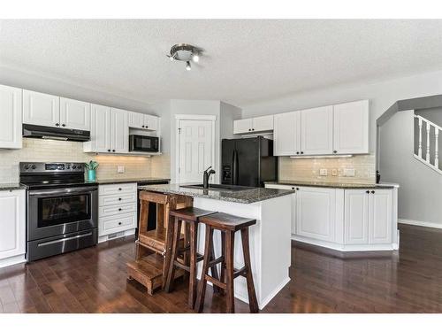 83 Chapala Way Se, Calgary, AB - Indoor Photo Showing Kitchen With Upgraded Kitchen