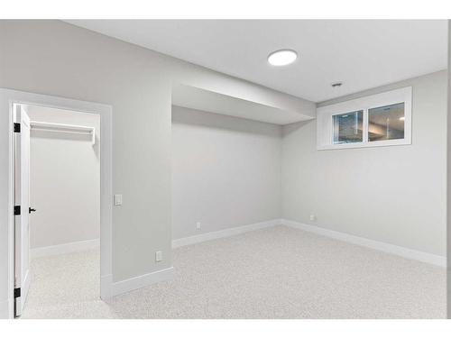 25 Stillwater Bay, Heritage Pointe, AB - Indoor Photo Showing Other Room