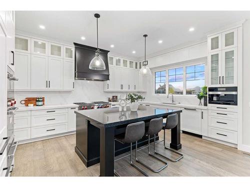 25 Stillwater Bay, Heritage Pointe, AB - Indoor Photo Showing Kitchen With Upgraded Kitchen