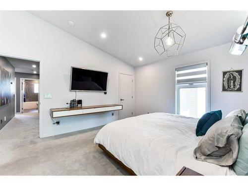 2253 Woodpark Avenue Sw, Calgary, AB - Indoor Photo Showing Bedroom
