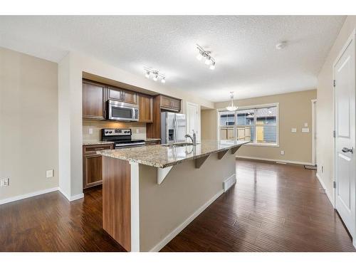 69 Marine Drive Se, Calgary, AB - Indoor Photo Showing Kitchen With Upgraded Kitchen