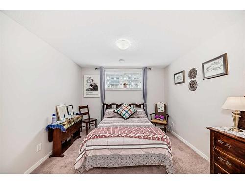 374 Fireside Place, Cochrane, AB - Indoor Photo Showing Bedroom