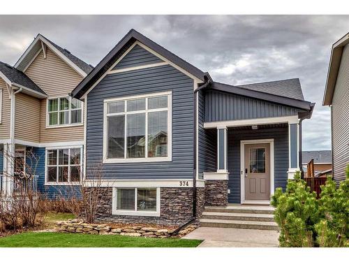 374 Fireside Place, Cochrane, AB - Outdoor With Facade