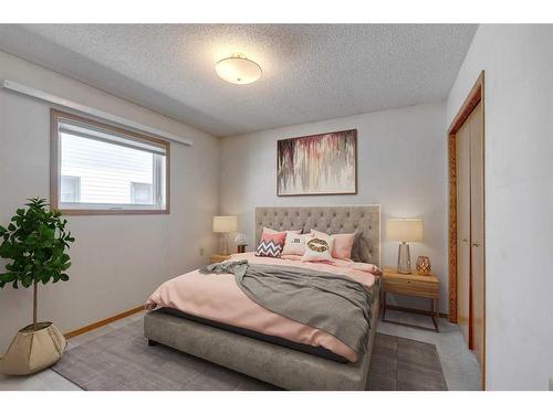 273 Woodside Road Nw, Airdrie, AB - Indoor Photo Showing Bedroom