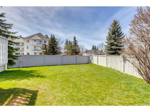 273 Woodside Road Nw, Airdrie, AB - Outdoor With Backyard