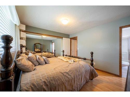 76 Lake Huron Place Se, Calgary, AB - Indoor Photo Showing Bedroom