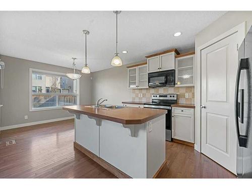 580 Cranston Drive Se, Calgary, AB - Indoor Photo Showing Kitchen With Upgraded Kitchen