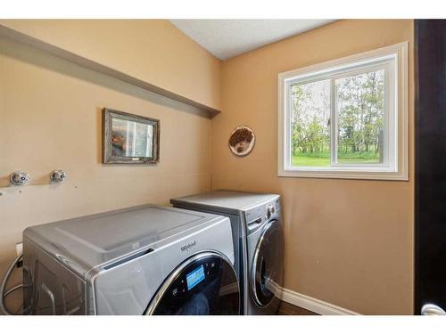 200-80054 226 Avenue West, Rural Foothills County, AB - Indoor Photo Showing Laundry Room