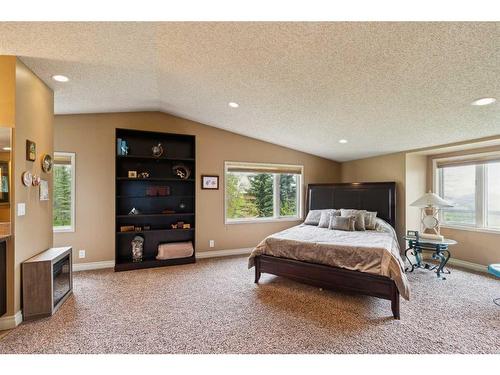200-80054 226 Avenue West, Rural Foothills County, AB - Indoor Photo Showing Bedroom