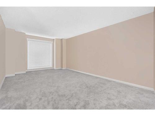 18 Mckernan Place Se, Calgary, AB - Indoor Photo Showing Other Room