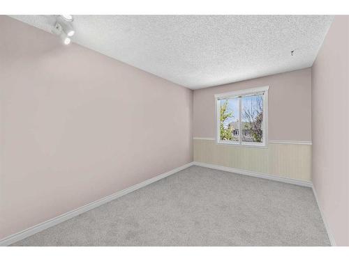 18 Mckernan Place Se, Calgary, AB - Indoor Photo Showing Other Room