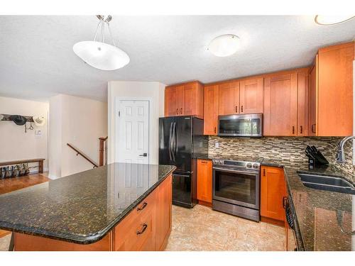 56 Brookpark Place Sw, Calgary, AB - Indoor Photo Showing Kitchen With Double Sink