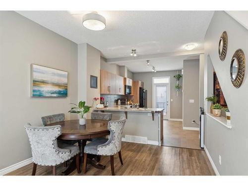 220 New Brighton Row Se, Calgary, AB - Indoor Photo Showing Dining Room