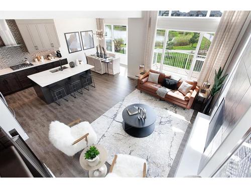 7 Midgrove Drive Sw, Airdrie, AB - Indoor Photo Showing Living Room