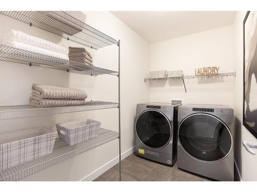 7 Midgrove Drive Sw, Airdrie, AB - Indoor Photo Showing Laundry Room