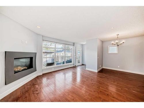 2743 16 Avenue Sw, Calgary, AB - Indoor Photo Showing Living Room With Fireplace