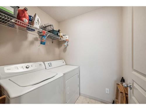 40 Chapalina Common Se, Calgary, AB - Indoor Photo Showing Laundry Room