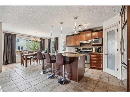 40 Chapalina Common Se, Calgary, AB - Indoor Photo Showing Kitchen With Upgraded Kitchen