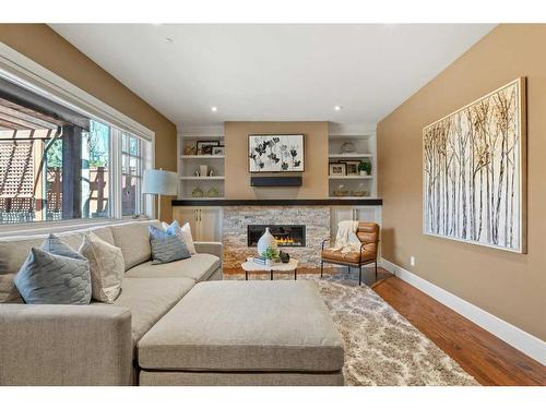2336 Uxbridge Drive Nw, Calgary, AB - Indoor Photo Showing Living Room With Fireplace