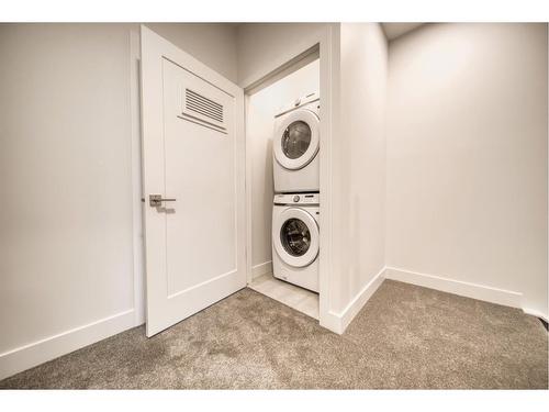 81 Royal Elm Green Nw, Calgary, AB - Indoor Photo Showing Laundry Room