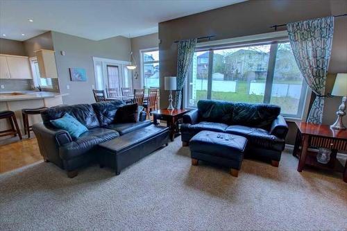418 Bridlewood Place Sw, Calgary, AB - Indoor Photo Showing Living Room