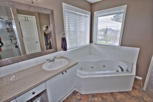 418 Bridlewood Place Sw, Calgary, AB - Indoor Photo Showing Bathroom