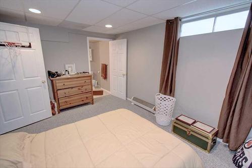 418 Bridlewood Place Sw, Calgary, AB - Indoor Photo Showing Bedroom