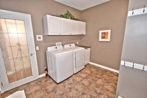 418 Bridlewood Place Sw, Calgary, AB - Indoor Photo Showing Laundry Room