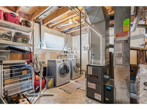 47 Shawbrooke Crescent Sw, Calgary, AB - Indoor Photo Showing Laundry Room