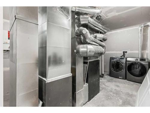 366 Silverado Way Sw, Calgary, AB - Indoor Photo Showing Laundry Room