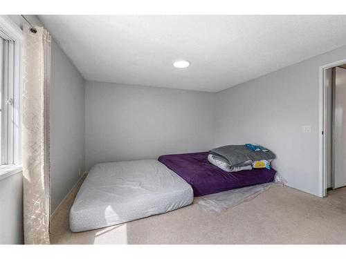 77 Castlebrook Way Ne, Calgary, AB - Indoor Photo Showing Bedroom