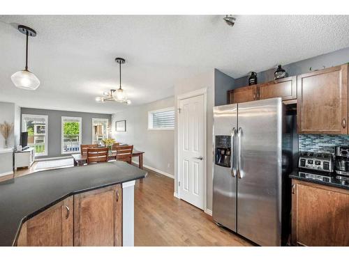 1173 New Brighton Park Se, Calgary, AB - Indoor Photo Showing Kitchen With Stainless Steel Kitchen