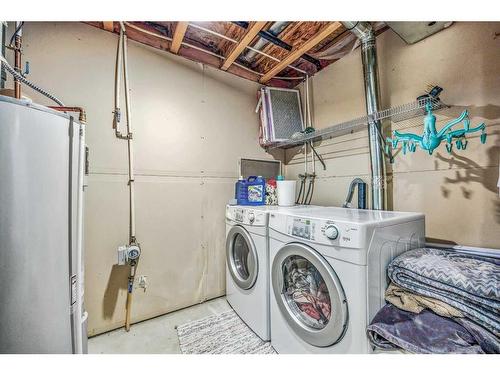 1173 New Brighton Park Se, Calgary, AB - Indoor Photo Showing Laundry Room