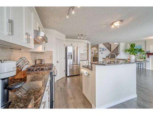 128 Tuscany Ravine Terrace Nw, Calgary, AB - Indoor Photo Showing Kitchen With Upgraded Kitchen