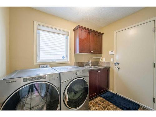 128 Tuscany Ravine Terrace Nw, Calgary, AB - Indoor Photo Showing Laundry Room