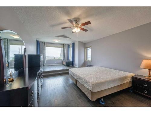 128 Tuscany Ravine Terrace Nw, Calgary, AB - Indoor Photo Showing Bedroom