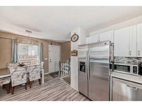 18 Martinridge Road Ne, Calgary, AB - Indoor Photo Showing Kitchen With Upgraded Kitchen