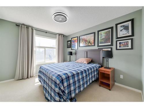 199 Chapalina Square Se, Calgary, AB - Indoor Photo Showing Bedroom