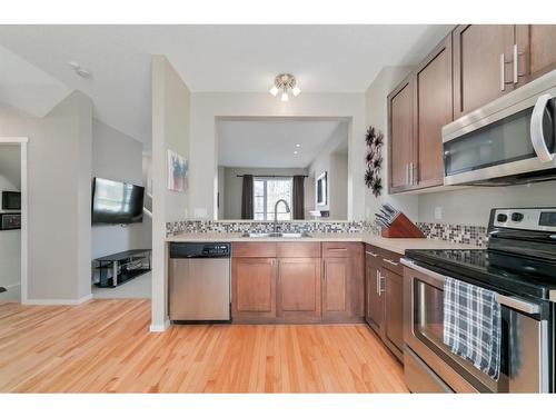 199 Chapalina Square Se, Calgary, AB - Indoor Photo Showing Kitchen With Stainless Steel Kitchen